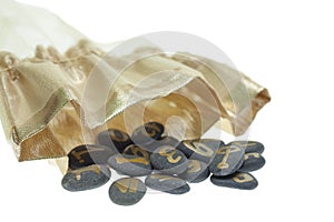 Stone runes with bag isolated on a white background