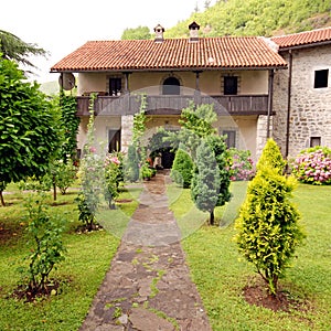 Stone rural house with pretty cottage garden.