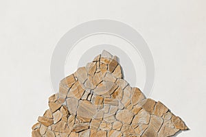 Stone sample rough mountain rock solid object white light wall pattern background empty space blank abstract facade