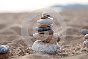 stone sculpture on the beach, beautiful pebble tower