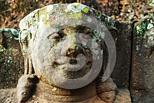 Stone sculpture face