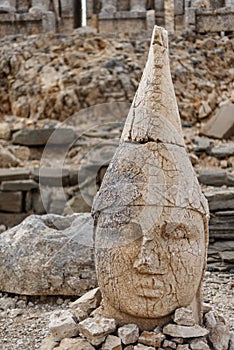 Stone sculpture of a Greek deity on the Mountain photo