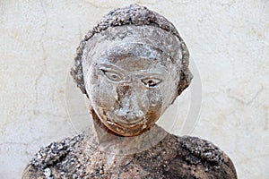 Stone sculpture of a grieving Buddhist monk, 3