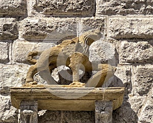 Stone sculpture of a griffin outside the Municipal Town Hall in the big square of Montepulciano, Italy.