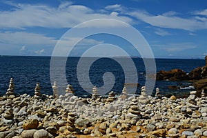stone sculptures on the shore of a beach in the city of Peniche
