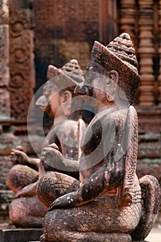 Stone sculputure sitting in front of temple B