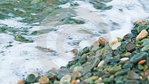 Stone At The Sea. Colorful Rolling Stones Sea Bottom. Multicolored Colorful Sea Pebbles. Bokeh.