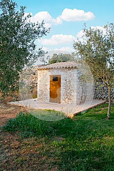 Stone shed at a backyard garden