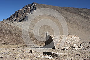 Stone shelter near Mulhacen in Sierra Nevada National Park photo
