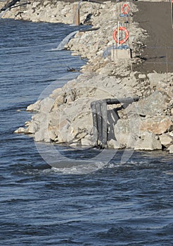 stone shoring on the river bank