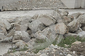 stone shoring on the river bank