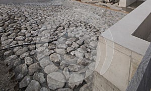 stone shoring on the river bank