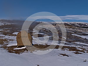 Sign in front of The Great Geysir, name giver for all geysers worldwide, in Geysir in Haukadalur, Golden Circle, Iceland.