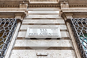 Stone Signage reporting the Italian Word Via Del Parlamento That Means in English Parliamant`s Street photo