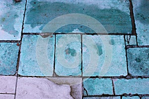 Stone slabs outdoors with Copper oxidation stains