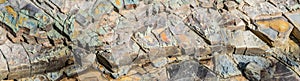 Stone splinters. Argillite close up wide background