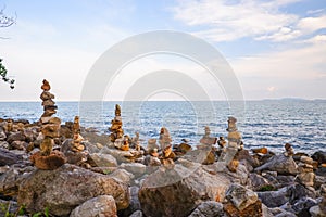 Stone stacked on rock beach at Laem Hua Mong - Kho Kwang Viewpoint in Chomphon province Thailand