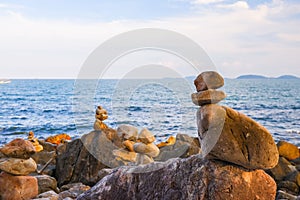 Stone stacked on rock beach at Laem Hua Mong - Kho Kwang Viewpoint in Thailand