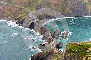 Access road to an island with long stone stairs