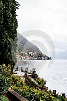 Stone staircase with balustrade over Lake Como. Villa Monastero, Italy