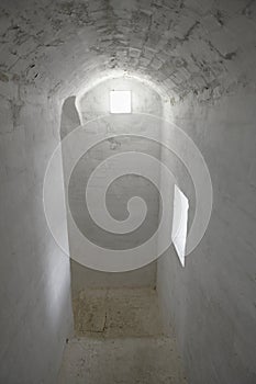 Stone staircase inside the narrow corridor of the bell tower of St. Nicholas Cathedral (built in 1800