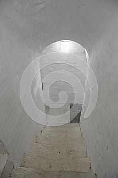 Stone staircase inside the narrow corridor of the bell tower of St. Nicholas Cathedral (built in 1800
