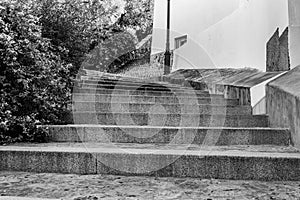 Stone staircase leading upwards in black and white