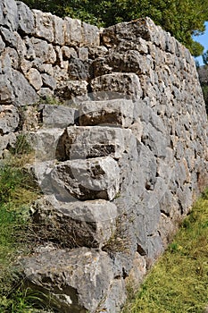 stone staircase on mountain terraces, farming in mountains, beautiful landscape, rural road, trees in background, agriculture and