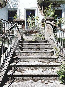 Stone staircase in an old abandoned house