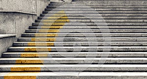 Stone staircase. Steps made of stone slabs. An up arrow is drawn on the steps. Concept of business development and career growth