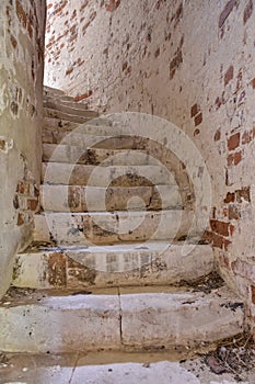 stone stairs in an abandoned building