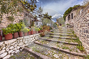 Stone stairs in alley with gardens on Lesbos island Greece