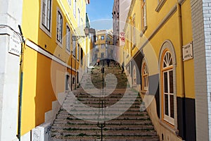 Stone stairs of the colorful street Travessa da Arrochela in the Bairro Alto neighborhood, Lisbon, Portugal