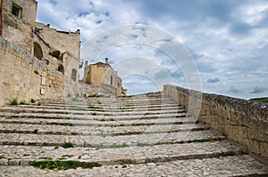 Stone stairs with grass, Sasso Caveoso, Sassi di Matera, Italy