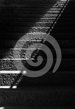 Stone stairs with light beam and shadow