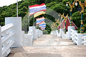 Stone stairs pathway for thai people and foreign travelers walking to travel visit viewpoint Ko Sichang island and mountain in the