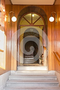 Stone stairs and wooden entrance to a building