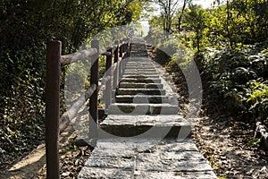 Stone stairway, stair, trail, footpath, country road, alley, lane in Hong Kong forest as background, Tsing Yi Nature Trails