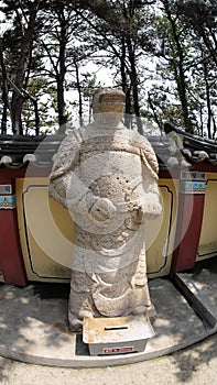 Stone statue of Buddha, deity, sacred animal and creature