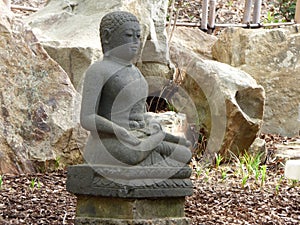 Stone Statue of Buddha in Japanese Garden