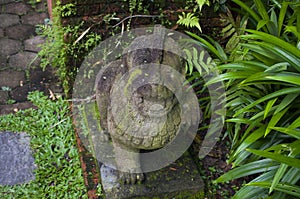 A stone statue in the Fort Canning park, in Singapore