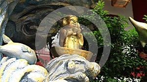 Stone statue guardian dog at Kanda shrine in Tokyo