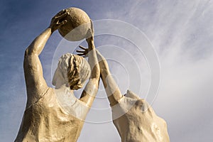 Stone Statue Human Women Netball Players in Action