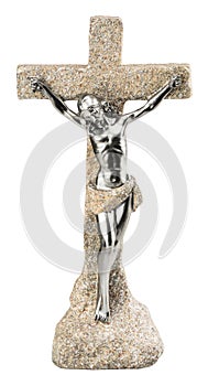 A stone statue of Jesus Christ crucified isolated on a white backgorund