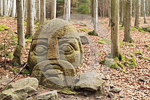 Stone statue of Knight of Blanik in forest on hill Great Blanik