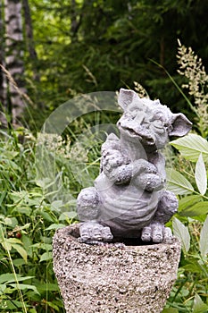 Stone statue of a little dragon