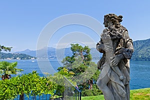 Stone statue in the park of Villa del Balbianello, Lenno, Lombardia, Italy photo