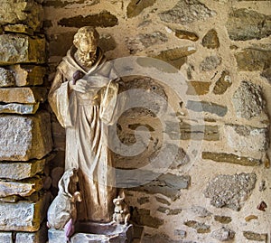 Stone statue of Patron Saint of animals photo