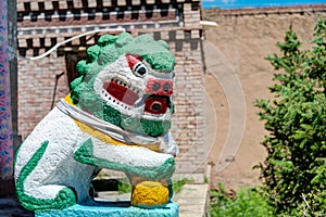 Stone statue, A rig Monastery(Arou Dasi). a famous landmark in the Tibetan city of Qilian, Qinghai, China.