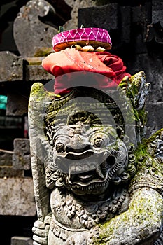 Stone Statue and sacrificial